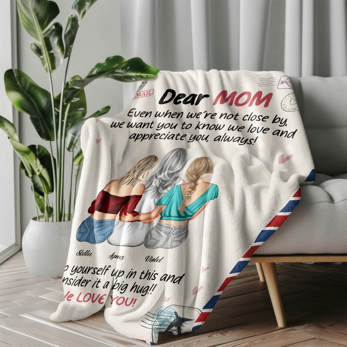 Personalized mom blanket featuring heartfelt message and illustrations of daughters embracing