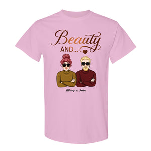 Pink Beauty and the Beard shirt with cartoon couple wearing sunglasses and crossed arms