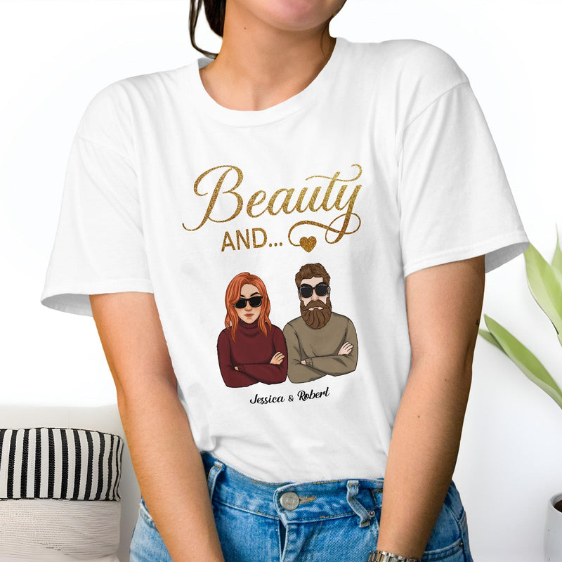 White Beauty and the Beard shirt with cartoon couple graphic worn with blue jeans