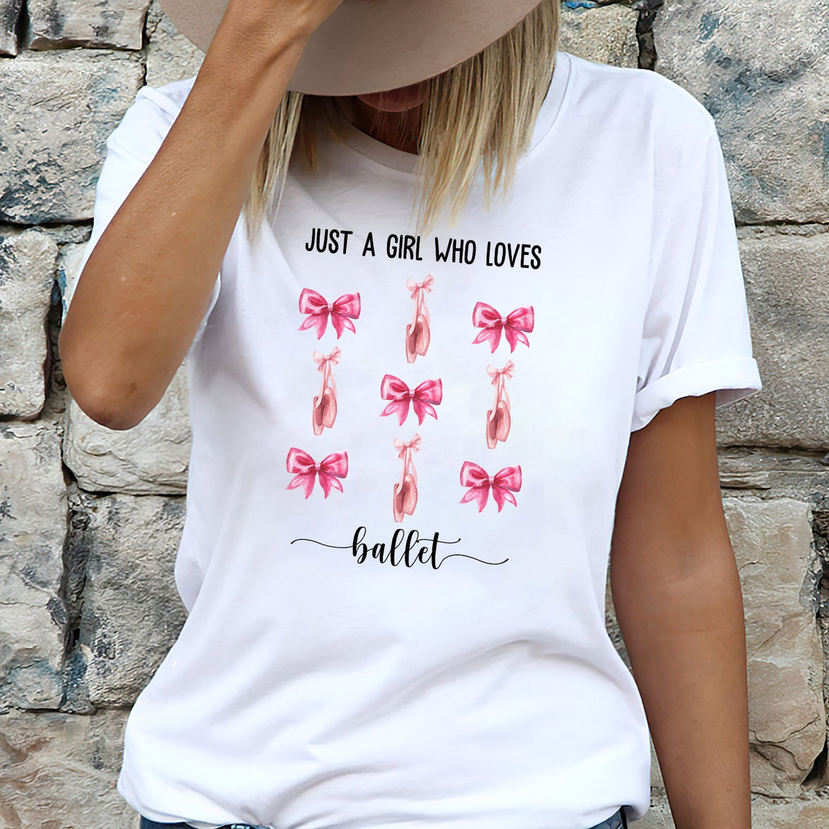 365Gifty coquette pink bow baseball tee with ballet design and rolled sleeves on model