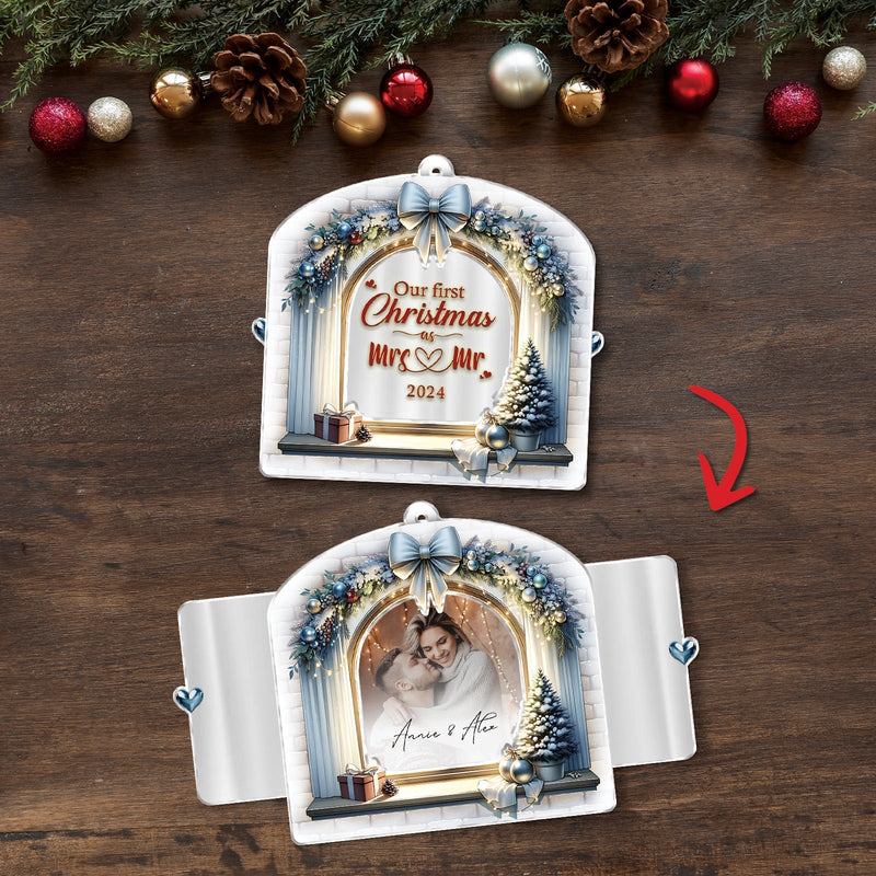 Personalized first Christmas ornament for couples featuring a winter wreath, blue bow, Christmas tree, and custom photo display