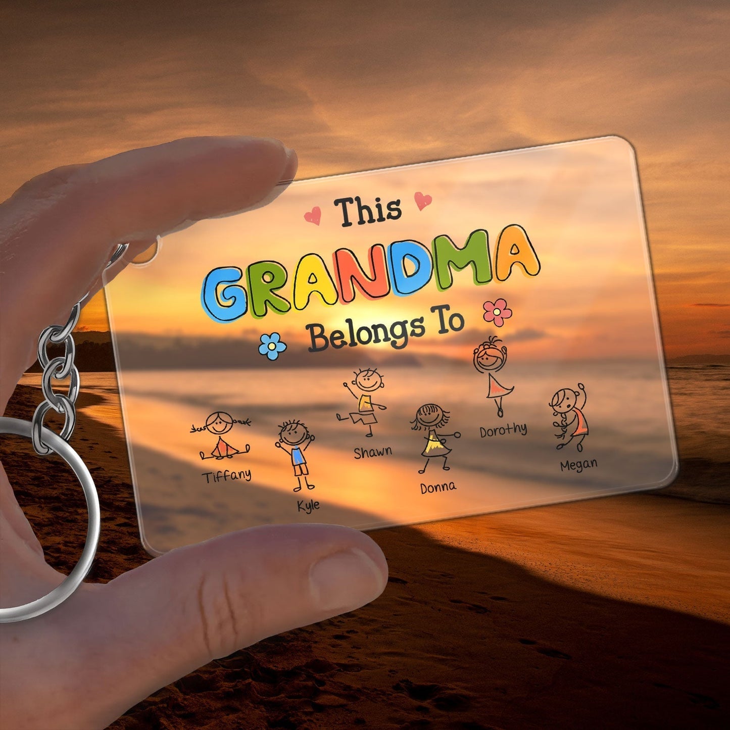 Custom family acrylic keychain with personalized names for Grandma, featuring a beach background