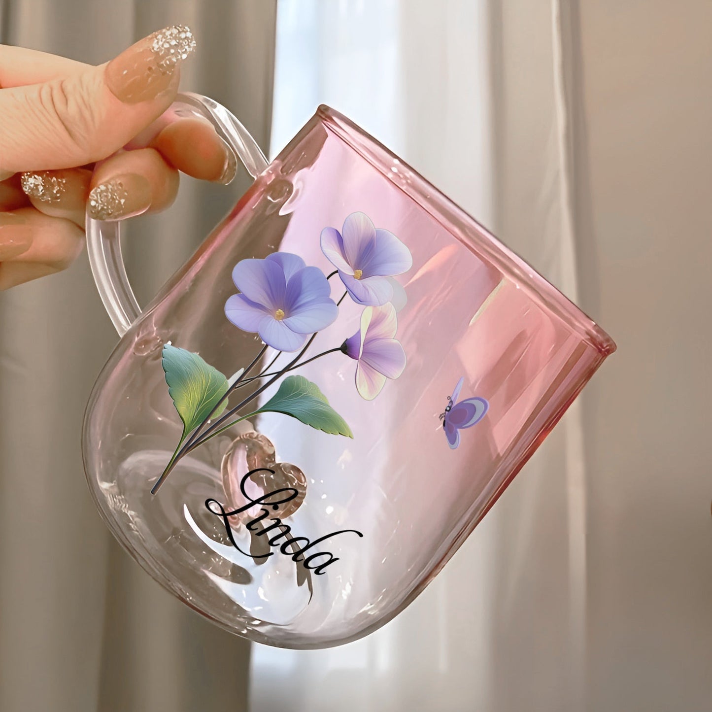 Custom floral glass mug gift featuring a pink design with purple flowers and personalized name