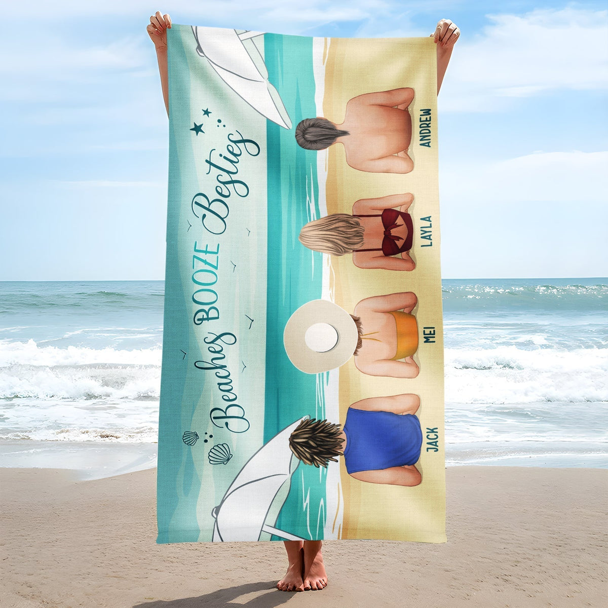 365Gifty Personalized Beach Towel showing four friends lying on sand by the ocean with custom names