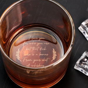 Close up of amber whiskey in a Personalized Whiskey Glass with engraved romantic message and laurel accents
