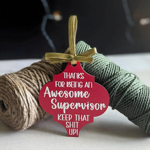 Funny Christmas wooden ornament in red with gold ribbon saying thanks for being an awesome supervisor