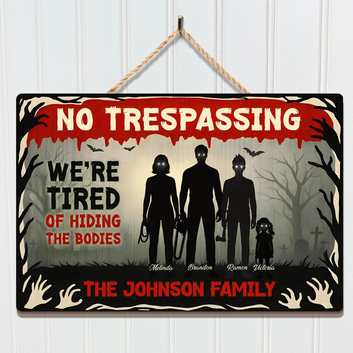 Halloween Wooden Door Sign featuring a spooky design with a family silhouette and a playful message