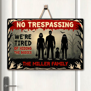 Halloween Wooden Door Sign with spooky design and 'No Trespassing' message for festive décor