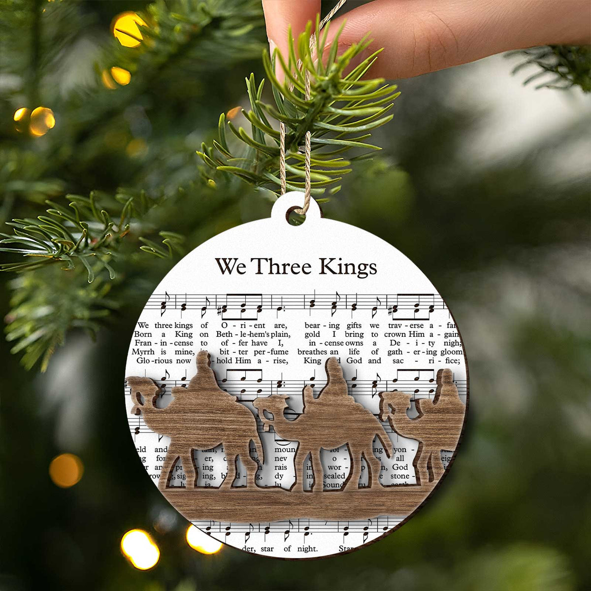 365Gifty music sheet nativity ornament featuring the Three Kings silhouette on printed sheet music