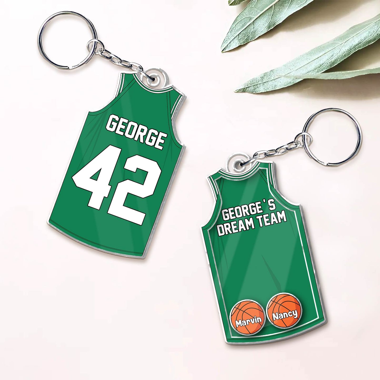 Personalized acrylic keychain for dad shaped like a basketball jersey with custom names