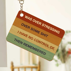 Personalized acrylic keychain featuring stress relief message in colorful design