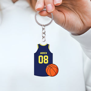 Personalized basketball jersey keychain featuring a custom name and number design