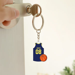 Personalized basketball jersey keychain featuring a blue jersey with the name Andrew and a basketball
