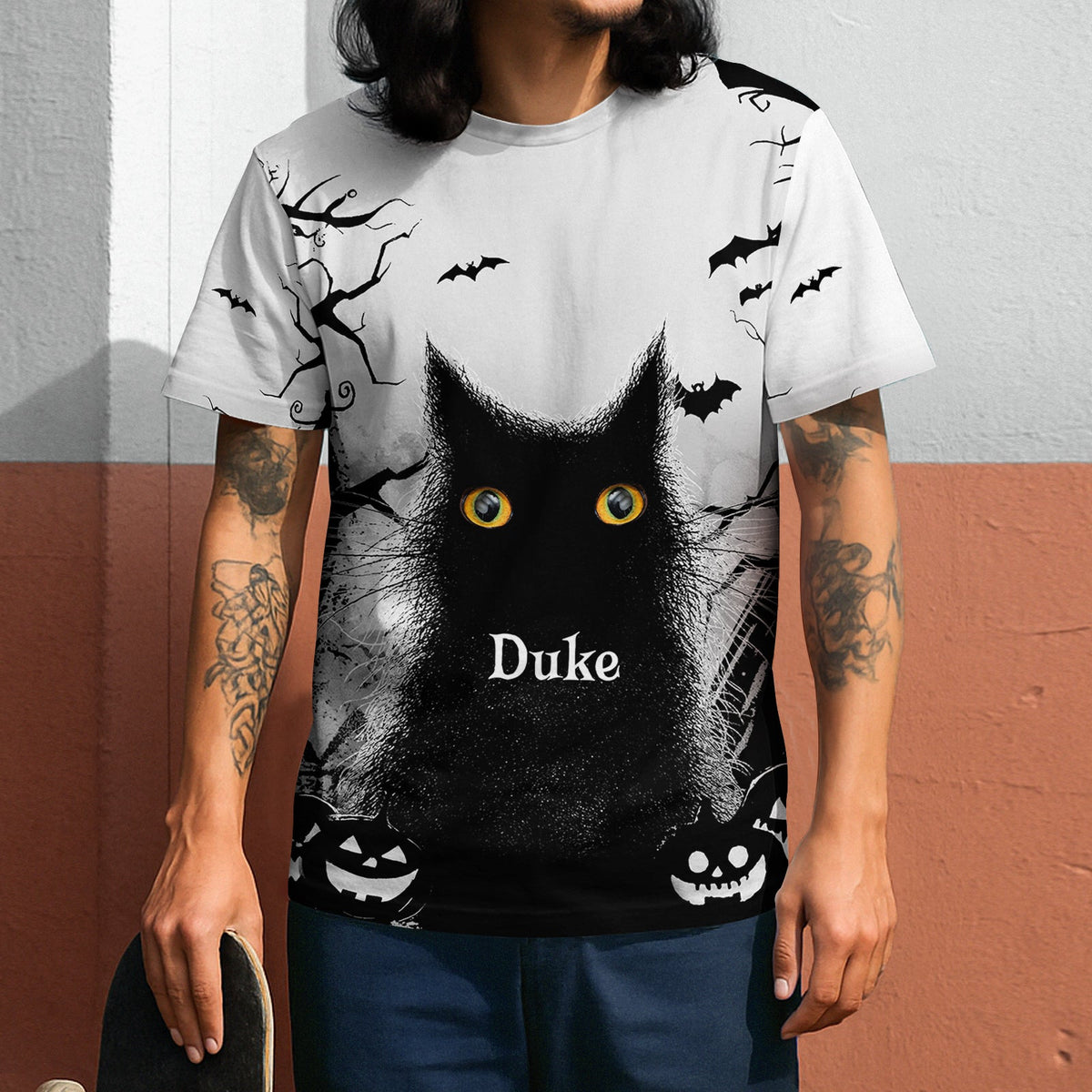 Personalized black cat Halloween shirt featuring spooky bats and pumpkins with the name Duke