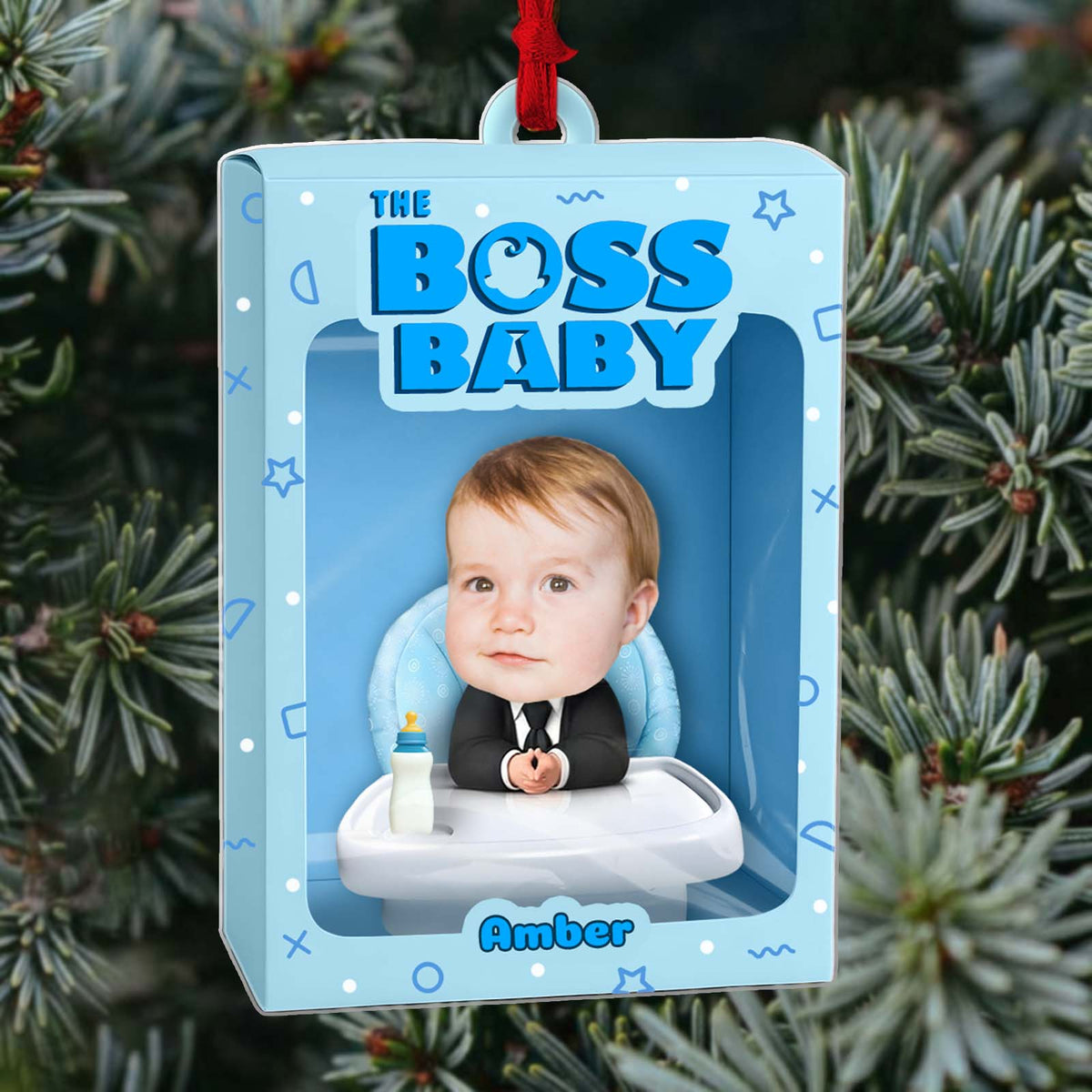 Personalized boss baby ornament featuring a baby in a suit with a bottle and custom name Amber