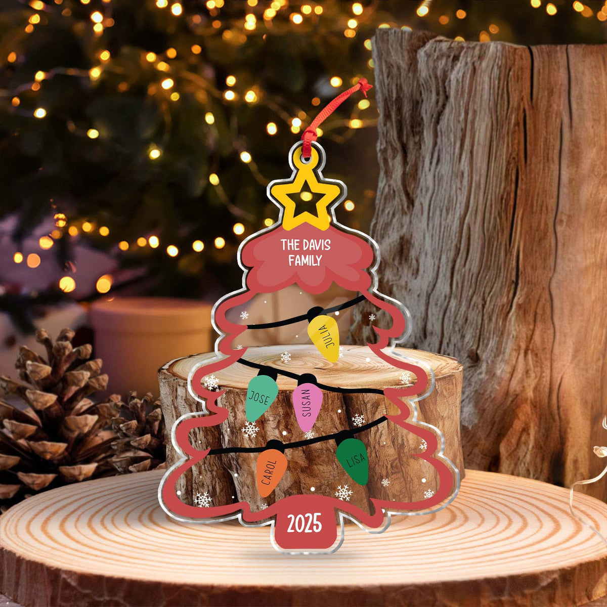 Personalized Christmas ornament shaped like a tree with names, perfect for family celebrations