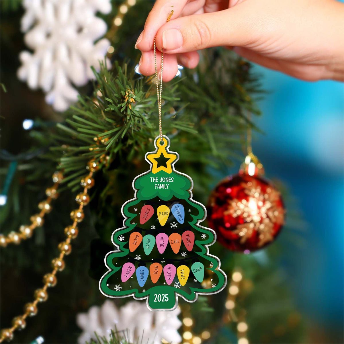 Personalized Christmas ornament shaped like a tree with family names and colorful lights for holiday memories