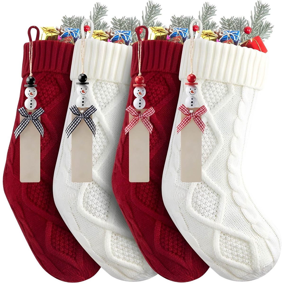 Set of red and white personalized Christmas stockings with snowman tags and assorted holiday gifts inside