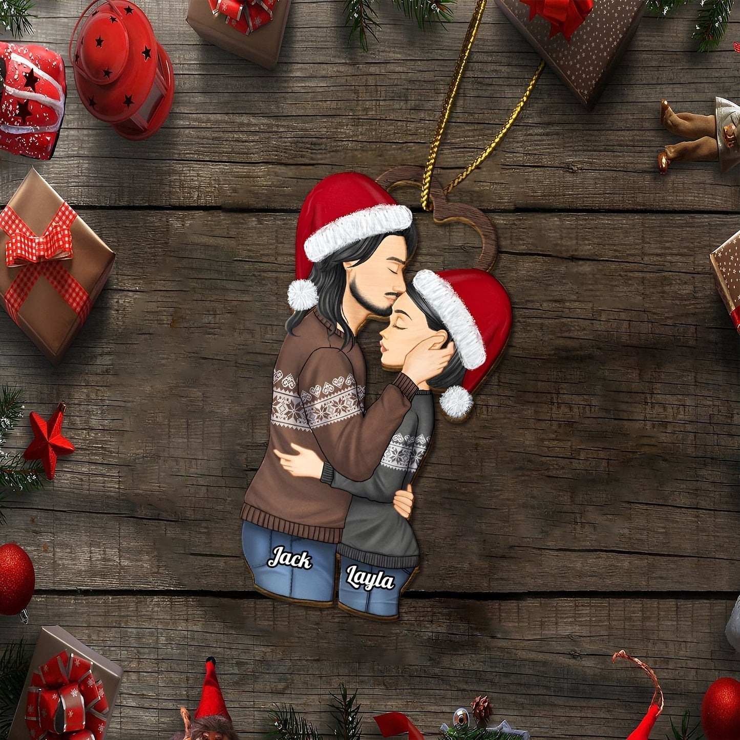 Personalized couple Christmas ornament featuring a kissing couple wearing Santa hats and cozy sweaters with names Jack and Layla
