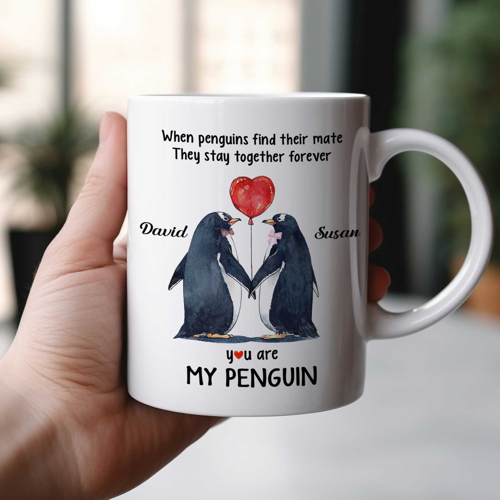 Personalized couple mug featuring penguins with names David and Susan and a love heart design