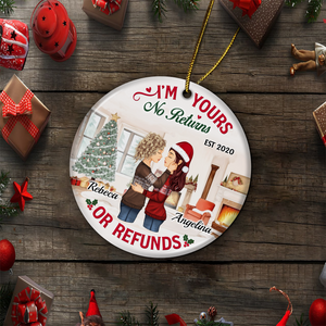 Personalized couple ornament with two women hugging by Christmas tree and fireplace with no refunds message