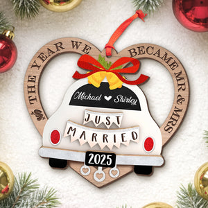 Personalized couple ornament featuring a wedding car design with names and the year 2025