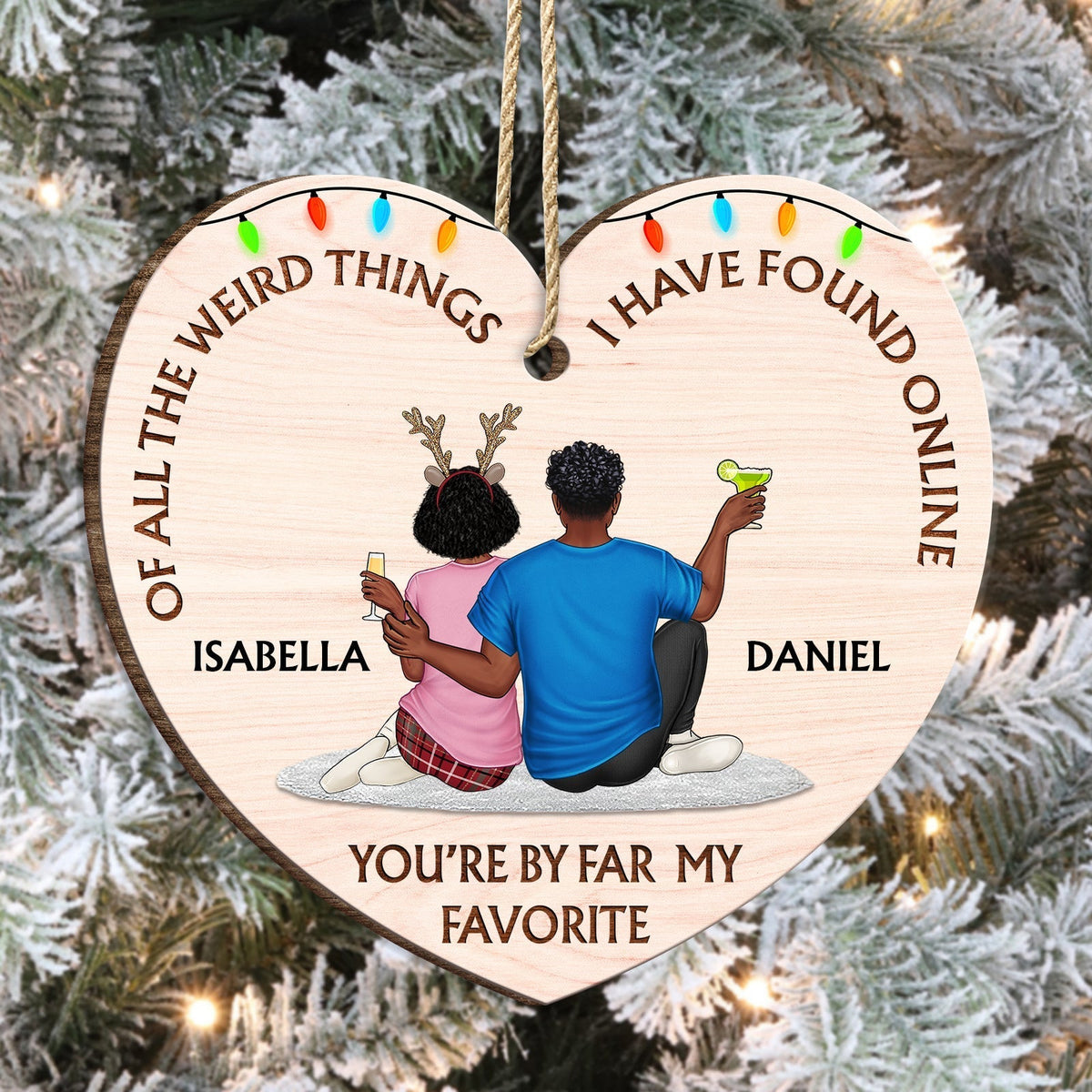 Personalized couple wooden ornament heart shape with names Isabella and Daniel and colorful lights
