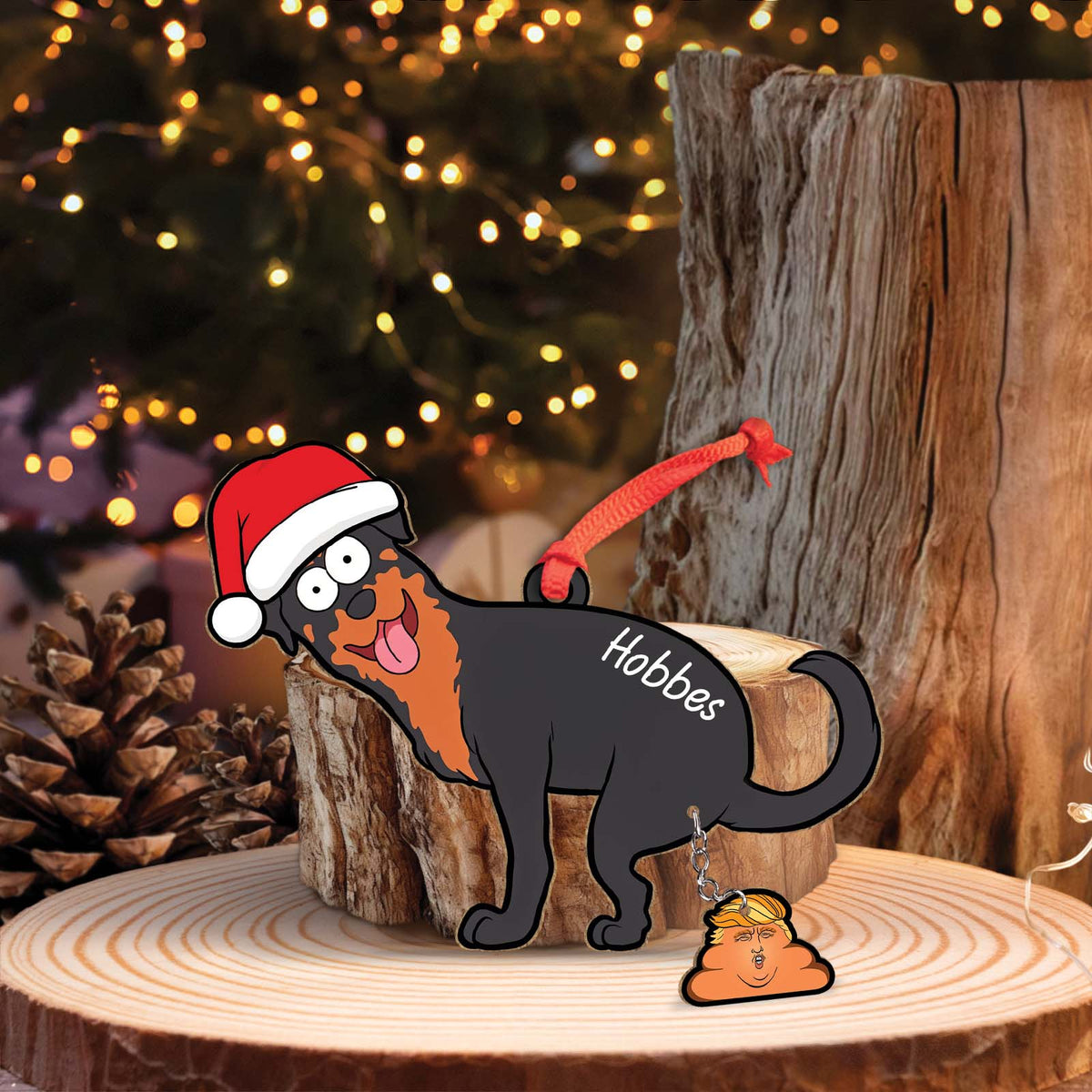 Personalized dog Christmas ornament featuring a black and brown dog with Santa hat and name Hobbes