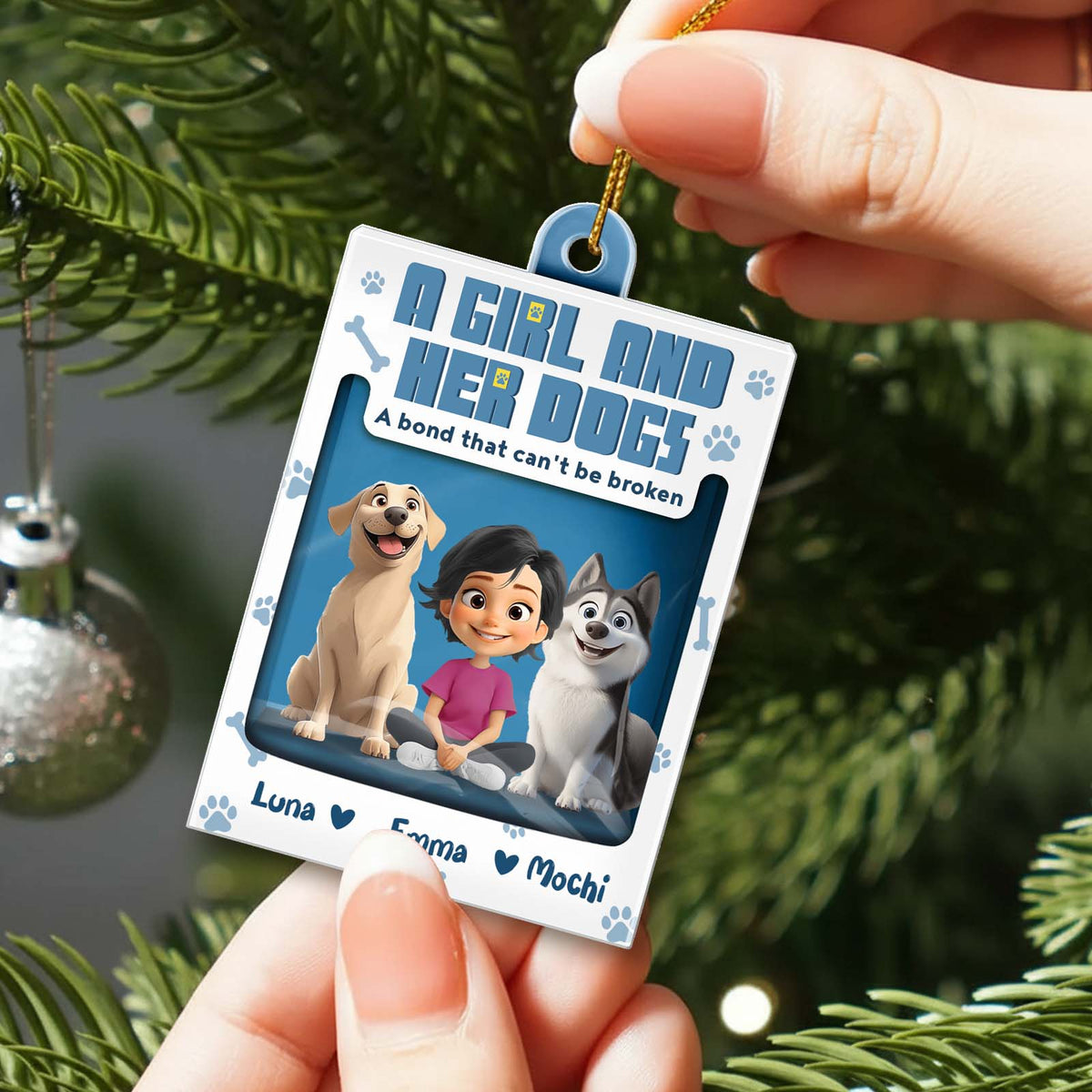 Personalized dog ornament featuring a girl with her dogs and custom names for pet lovers