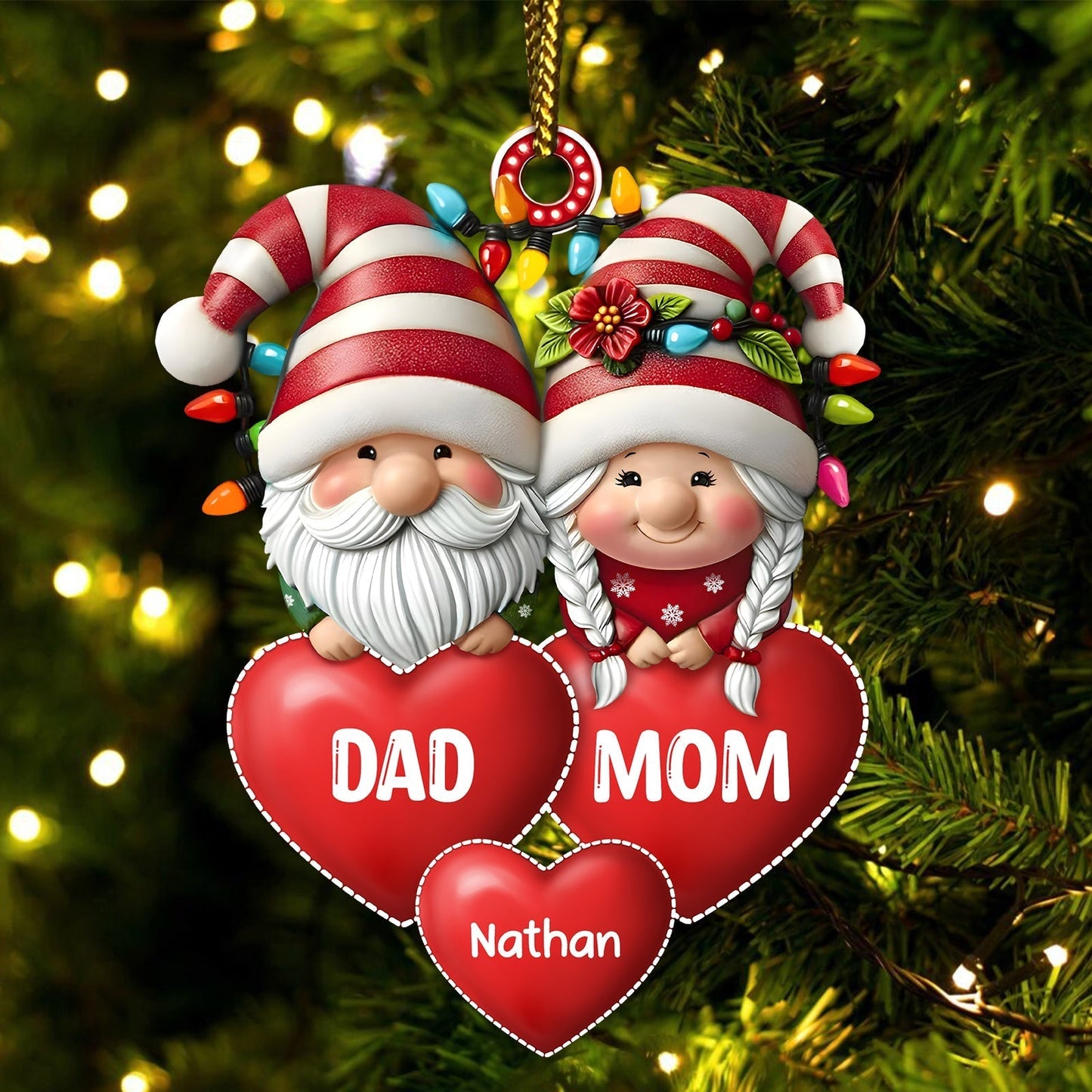 Personalized family Christmas ornament featuring Santa and Mrs. Claus with hearts for Dad and Mom