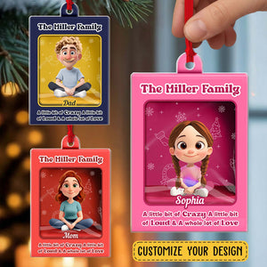 Personalized family Christmas ornament featuring cartoon characters for Mom, Dad, and Sophia