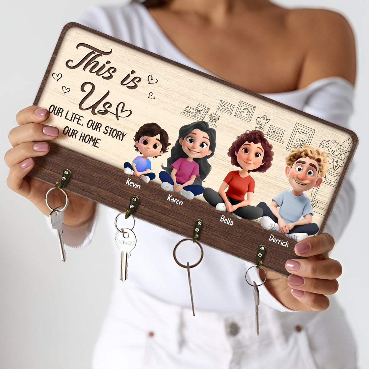 Personalized family key holder featuring cartoon characters and engraved names for a unique home decoration