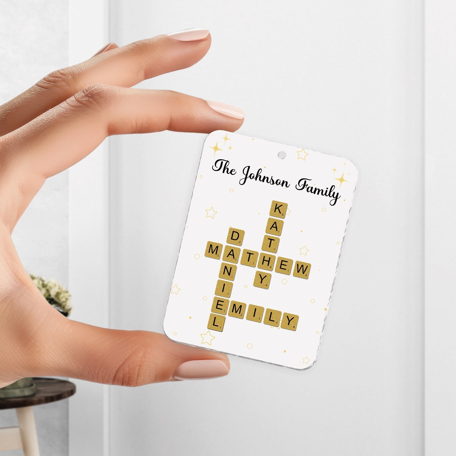 Personalized family keychain featuring the Johnson family's names in a crossword style