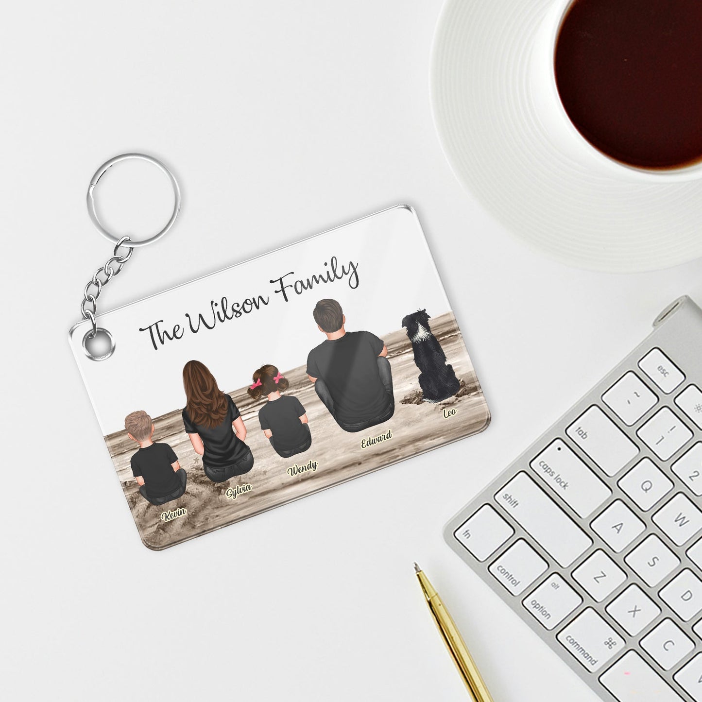 Personalized family keychain featuring the Wilson family and their dog on a beach background