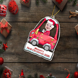 Personalized first Christmas ornament featuring a baby in a red car with Santa hat and custom text