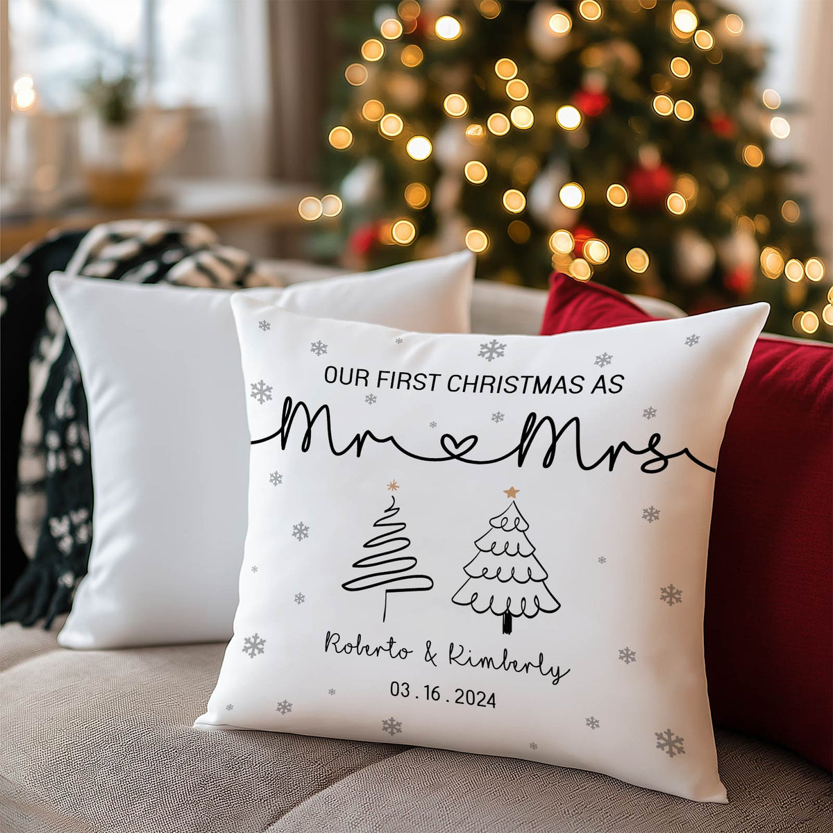 Personalized first Christmas pillow with Mr and Mrs design, names, and date on white pillow