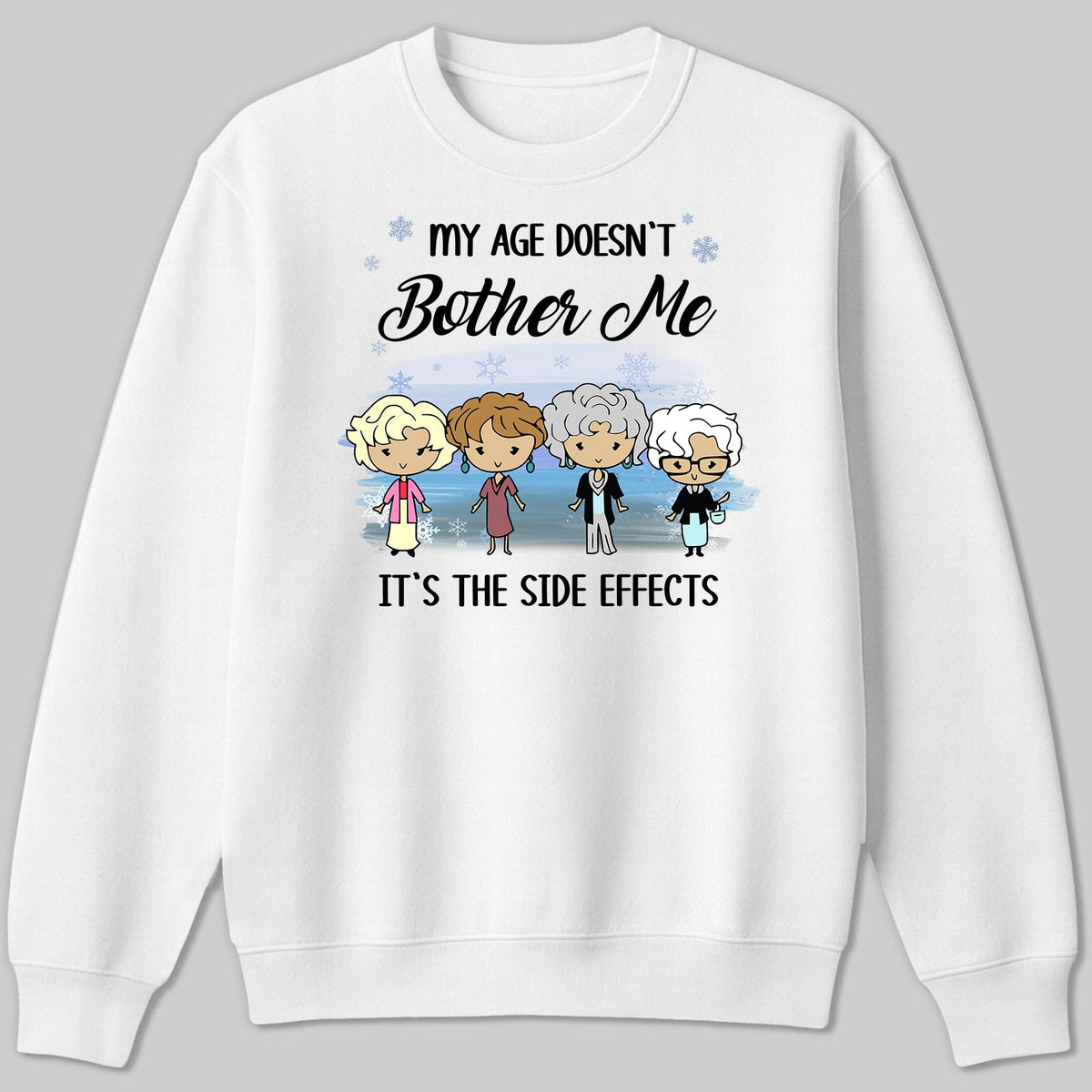 White sweatshirt with a humorous design saying My Age Doesn't Bother Me, featuring cartoon characters for a personalized funny shirt