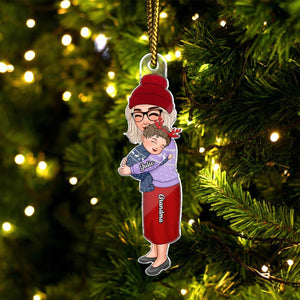 Personalized grandma and grandkid ornament featuring a loving embrace with custom names on a festive tree background