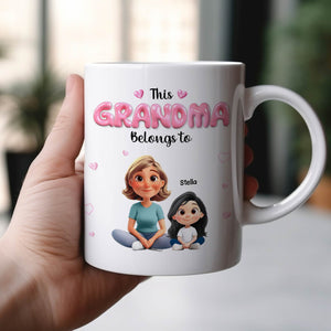 Personalized grandma mug featuring cartoon characters with the text This Grandma Belongs to Stella