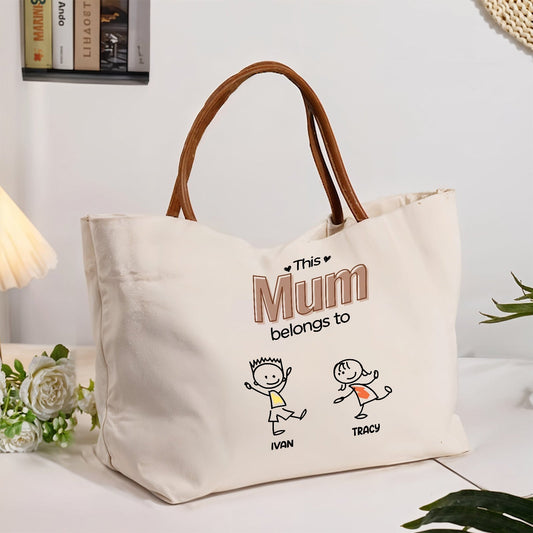 Personalized grandma tote bag featuring cartoon characters and the words This Mum belongs to Ivan and Tracy
