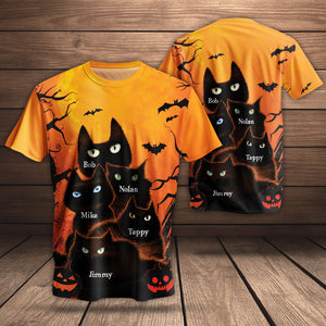 Personalized Halloween cat t-shirt featuring black cats and spooky pumpkins with names on the design
