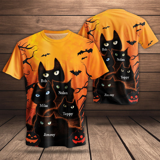 Personalized Halloween cat t-shirt featuring black cats and spooky pumpkins with names on the design