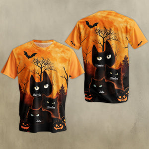 Personalized Halloween cat t-shirt featuring spooky black cats and pumpkins against an orange backdrop