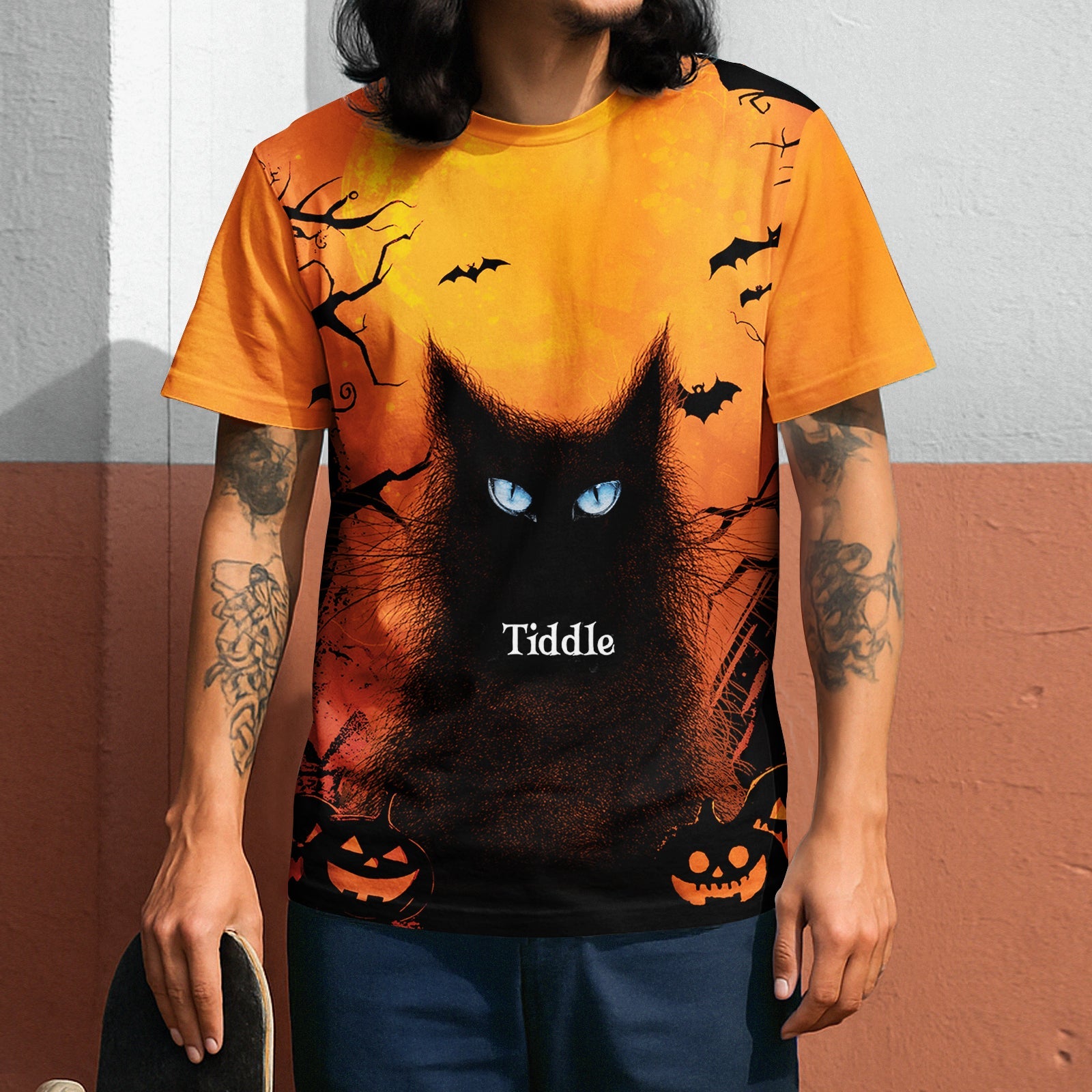 Personalized Halloween cat t-shirt featuring a black cat with blue eyes and spooky decorations