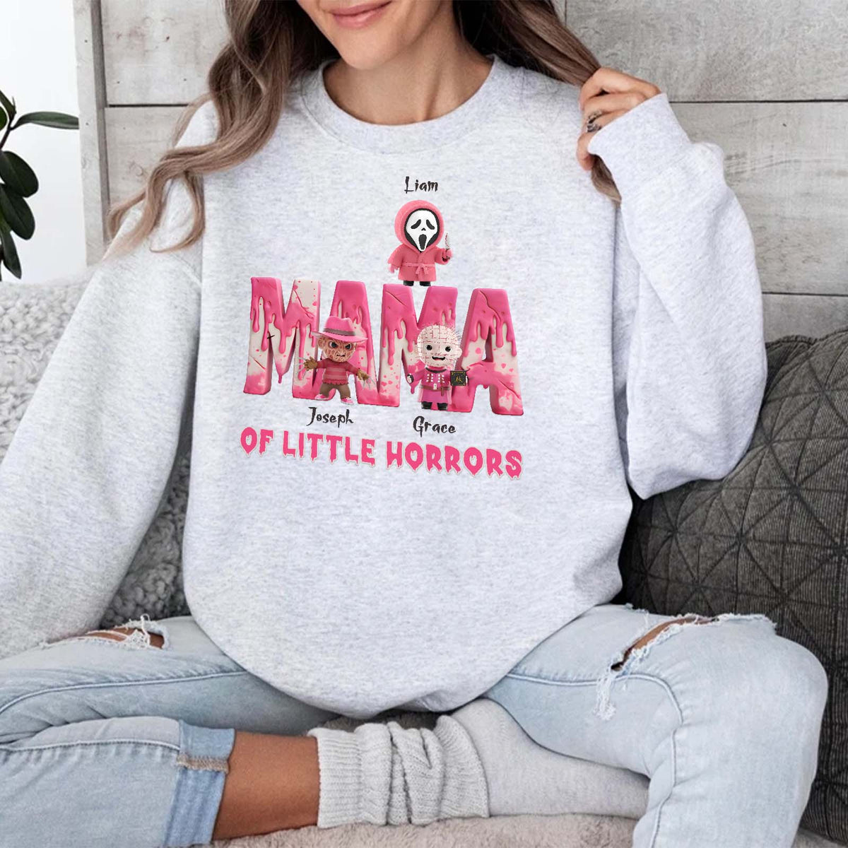 Personalized Halloween mama shirt in light gray with horror character designs and names Liam Joseph Grace