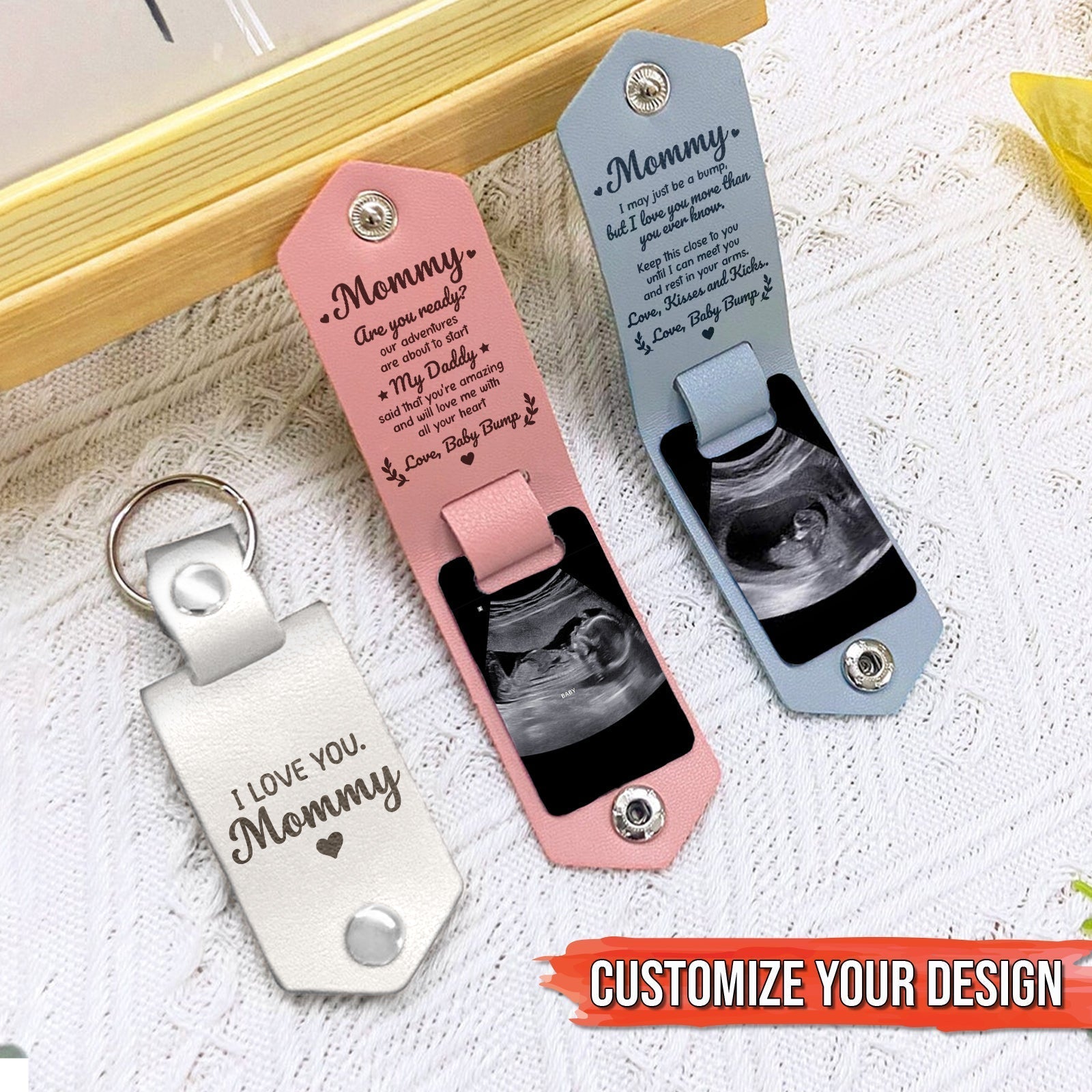 Personalized leather photo keychain in pink and blue with customizable design options