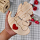 Personalized mama bear puzzle made of wood featuring names Amanda and Jon with a red heart accent