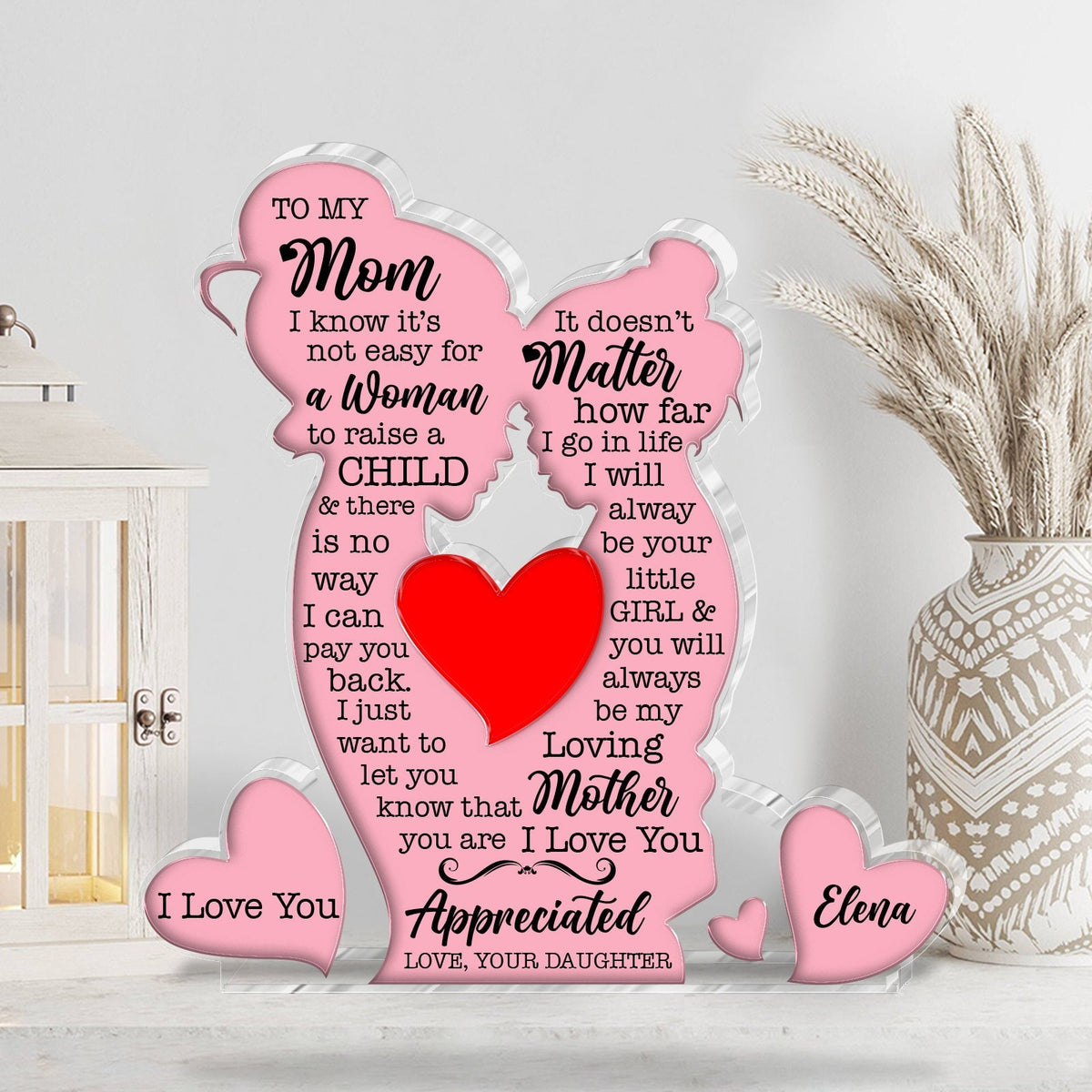 Personalized mom acrylic plaque with heartfelt message and pink accents showcasing love for mothers