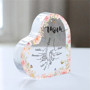 Personalized mom acrylic plaque with floral design and family names engraved on a heart-shaped base