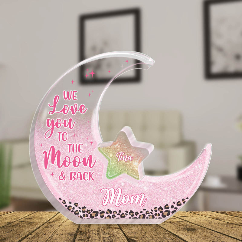 Personalized mom acrylic puzzle in moon shape with star, featuring the text We Love You to the Moon & Back